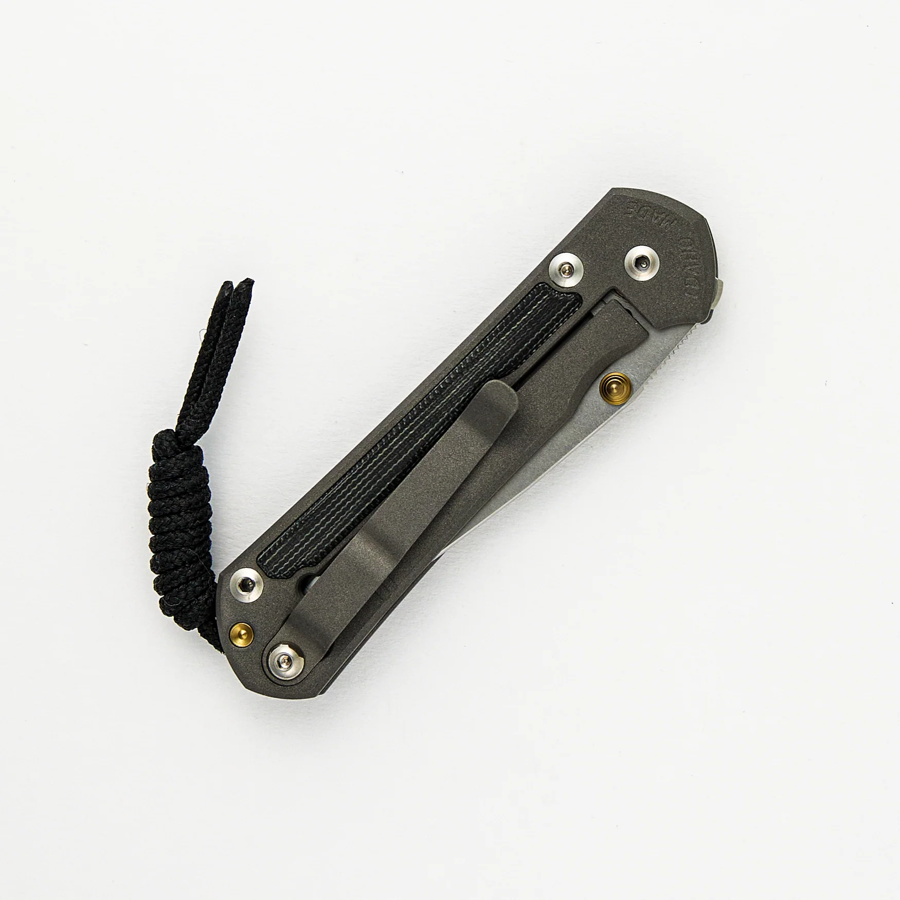 Small Sebenza 31 - Black Canvas Micarta Inlay - Polished CPM MagnaCut Blade – Gold Double Thumb Lugs - Image 4