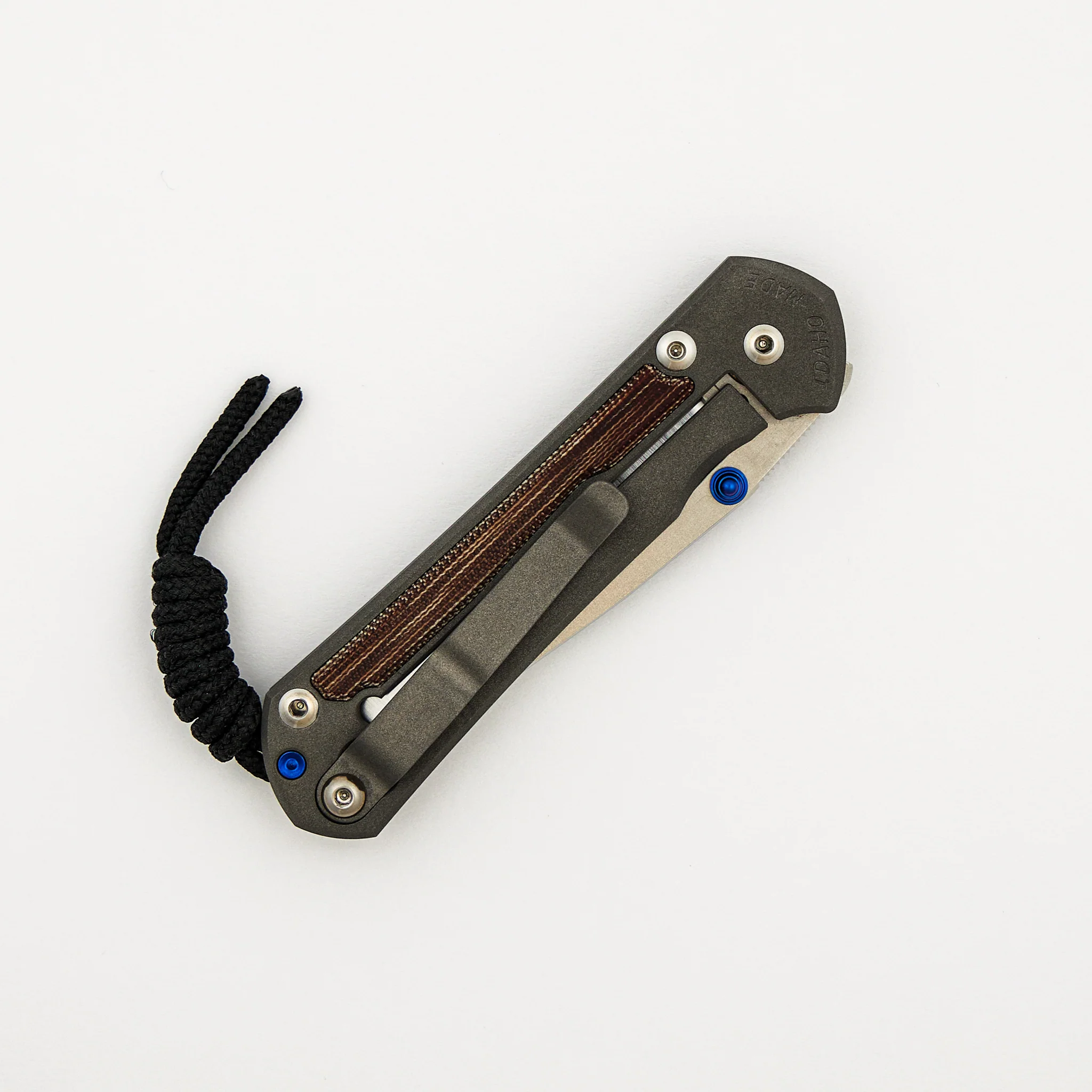 Small Sebenza 31 - Natural Canvas Micarta Inlay - Polished CPM MagnaCut Blade - Blue Double Thumb Lugs - Image 4