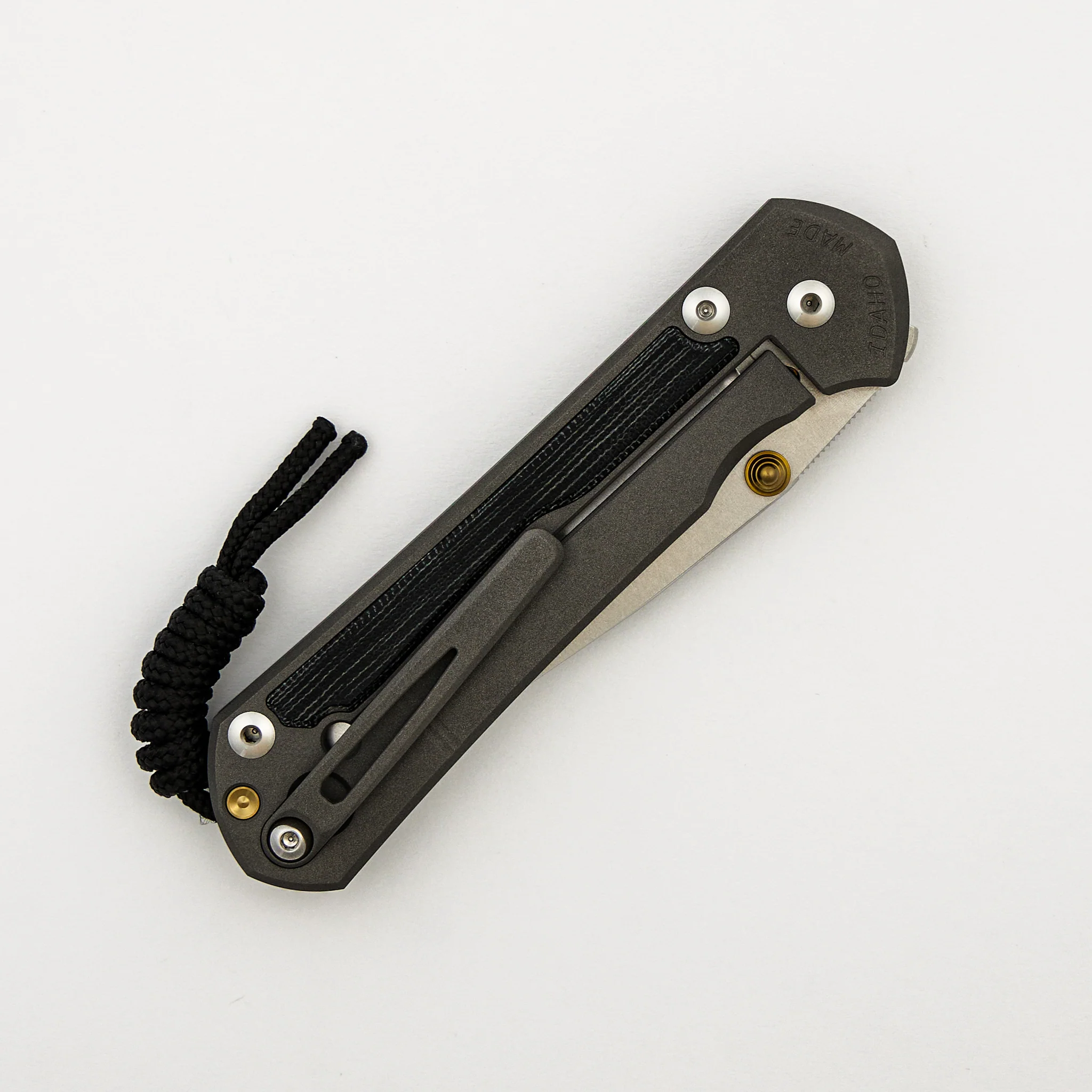 Large Sebenza 31 - Black Canvas Micarta Inlay - Drop Point CPM MagnaCut Blade - MIM Clip - Gold Double Thumb Lugs - Image 4
